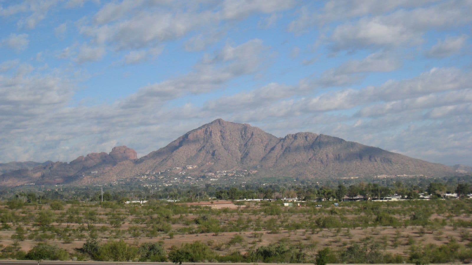 Camelback Mountain rising above the Phoenix skyline, viewed from the east valley